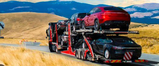 Car carrier on highway